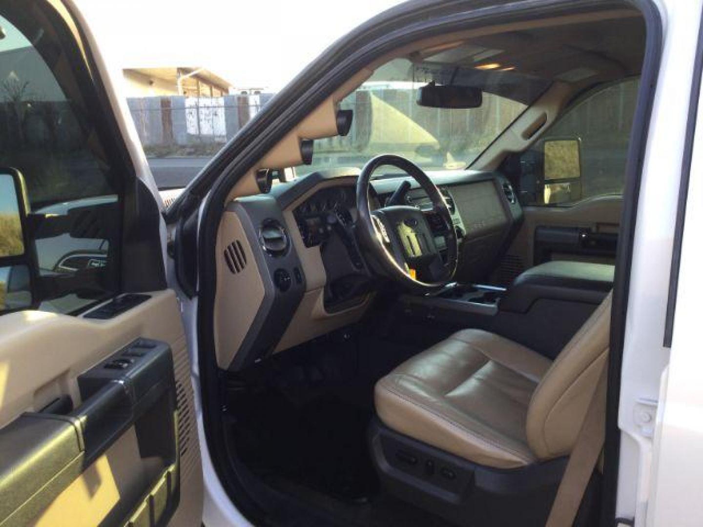 2012 White Platinum Metallic Tricoat /Adobe Leather Interior Ford F-250 SD Lariat Crew Cab 4WD (1FT7W2BT8CE) with an 6.7L V8 OHV 16V DIESEL engine, 6-Speed Automatic transmission, located at 1801 Main Street, Lewiston, 83501, (208) 743-9371, 46.417065, -117.004799 - Photo#3