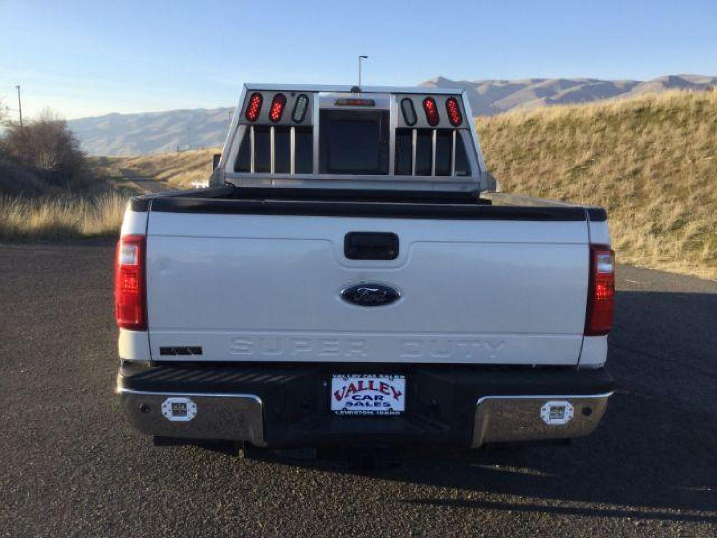 2012 White Platinum Metallic Tricoat /Adobe Leather Interior Ford F-250 SD Lariat Crew Cab 4WD (1FT7W2BT8CE) with an 6.7L V8 OHV 16V DIESEL engine, 6-Speed Automatic transmission, located at 1801 Main Street, Lewiston, 83501, (208) 743-9371, 46.417065, -117.004799 - Photo#5