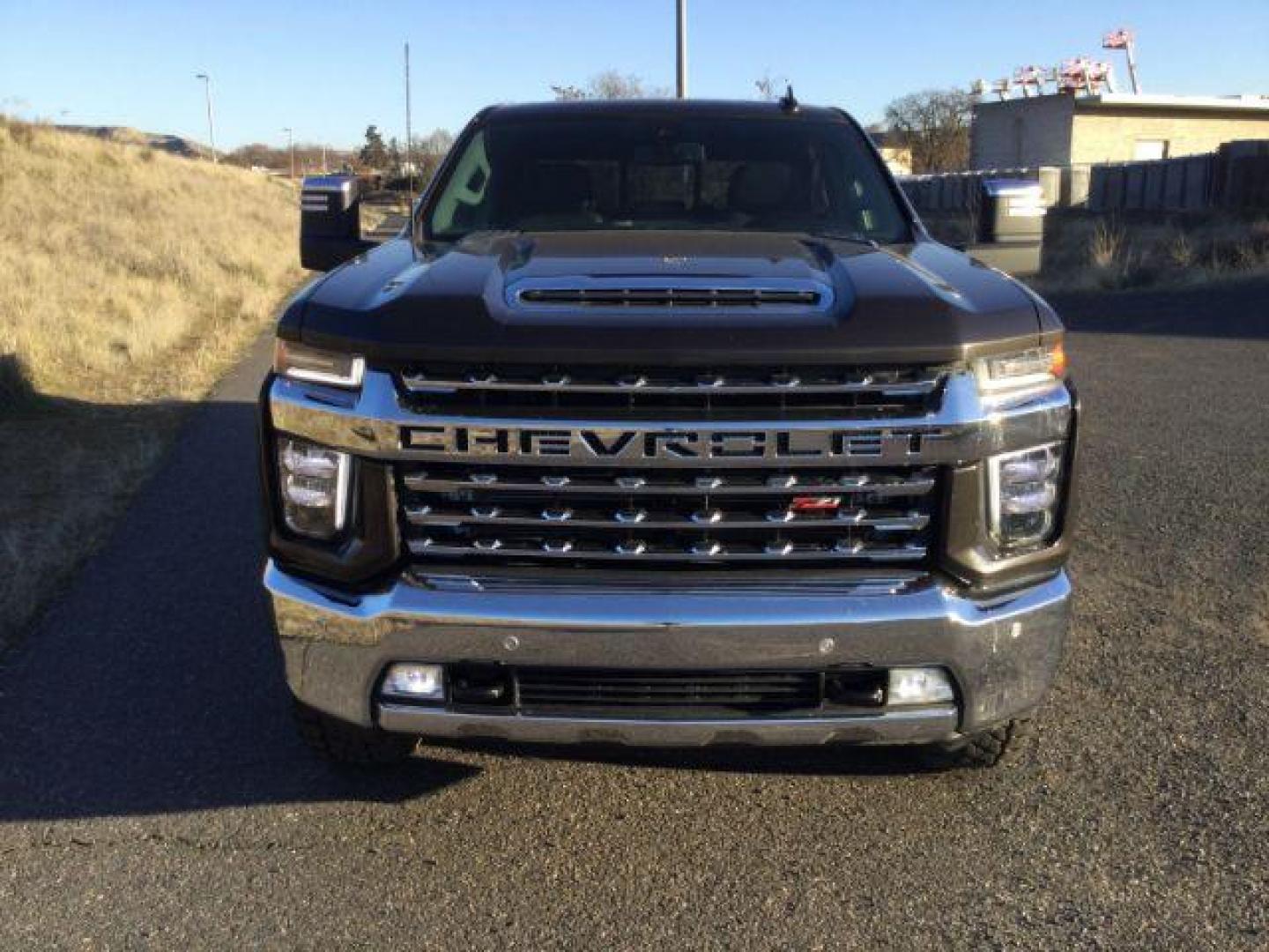 2021 Oxford Brown Metallic /Jet Black Chevrolet Silverado 3500HD 4WD Crew Cab Standard Bed LTZ | (1GC4YUEY9MF) with an 6.6L V8 OHV 32V TURBO DIESEL engine, 10-speed automatic transmission, located at 1801 Main Street, Lewiston, 83501, (208) 743-9371, 46.417065, -117.004799 - Photo#24