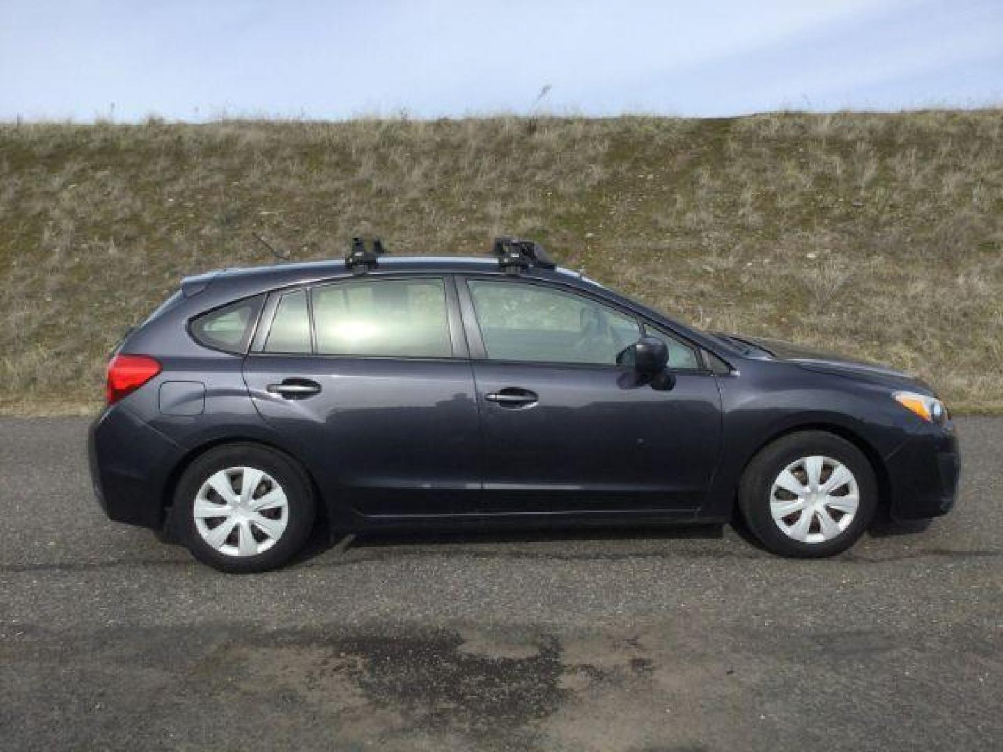 2013 Dark Gray Metallic Subaru Impreza 2.0i (JF1GPAA63D2) with an 2L H-4 DOHC engine, located at 1801 Main Street, Lewiston, 83501, (208) 743-9371, 46.417065, -117.004799 - Photo#18