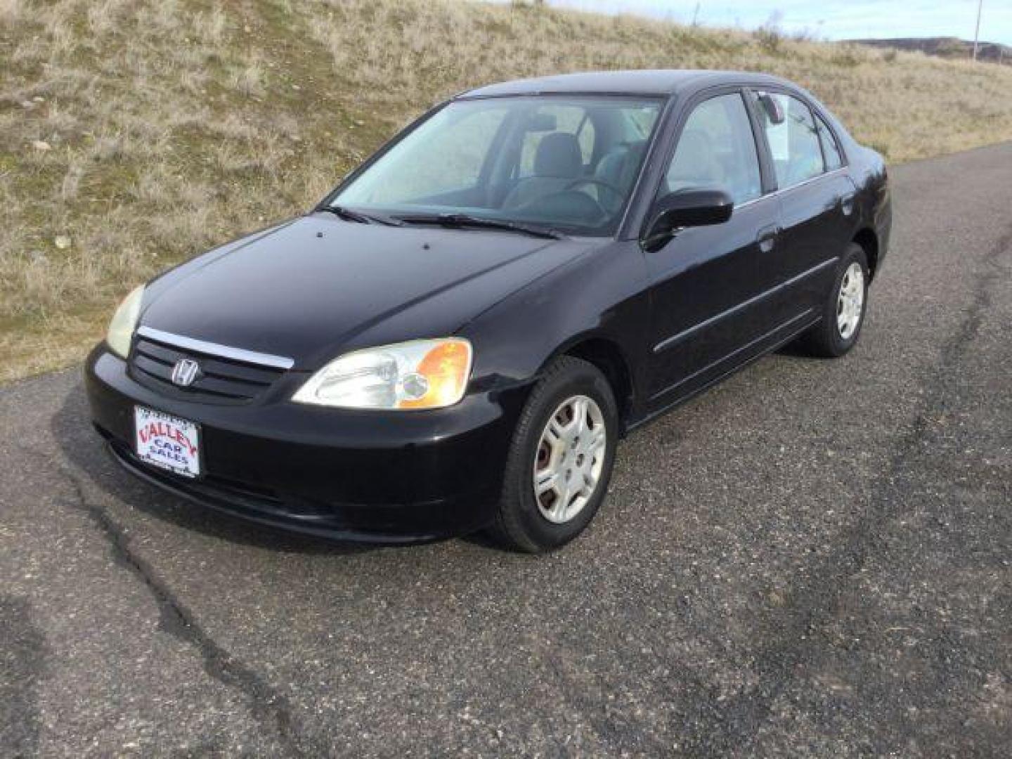 2002 BLACK /GRAY CLOTH HONDA CIVIC DX (2HGES16152H) with an 1.7L 4cyl engine, automatic transmission, located at 1801 Main Street, Lewiston, 83501, (208) 743-9371, 46.417065, -117.004799 - Photo#0