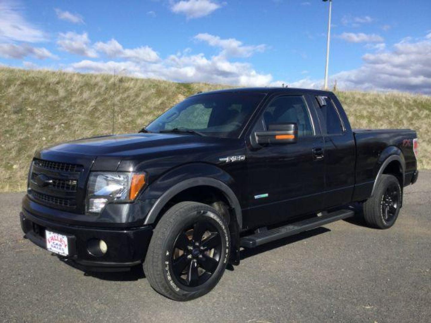 2012 Tuxedo Black Metallic /Black Cloth Ford F-150 FX4 Supercab 4WD (1FTFX1ET5CF) with an 5L V-8 DOHC engine, 6-SPEED AUTOMATIC transmission, located at 1801 Main Street, Lewiston, 83501, (208) 743-9371, 46.417065, -117.004799 - Photo#0