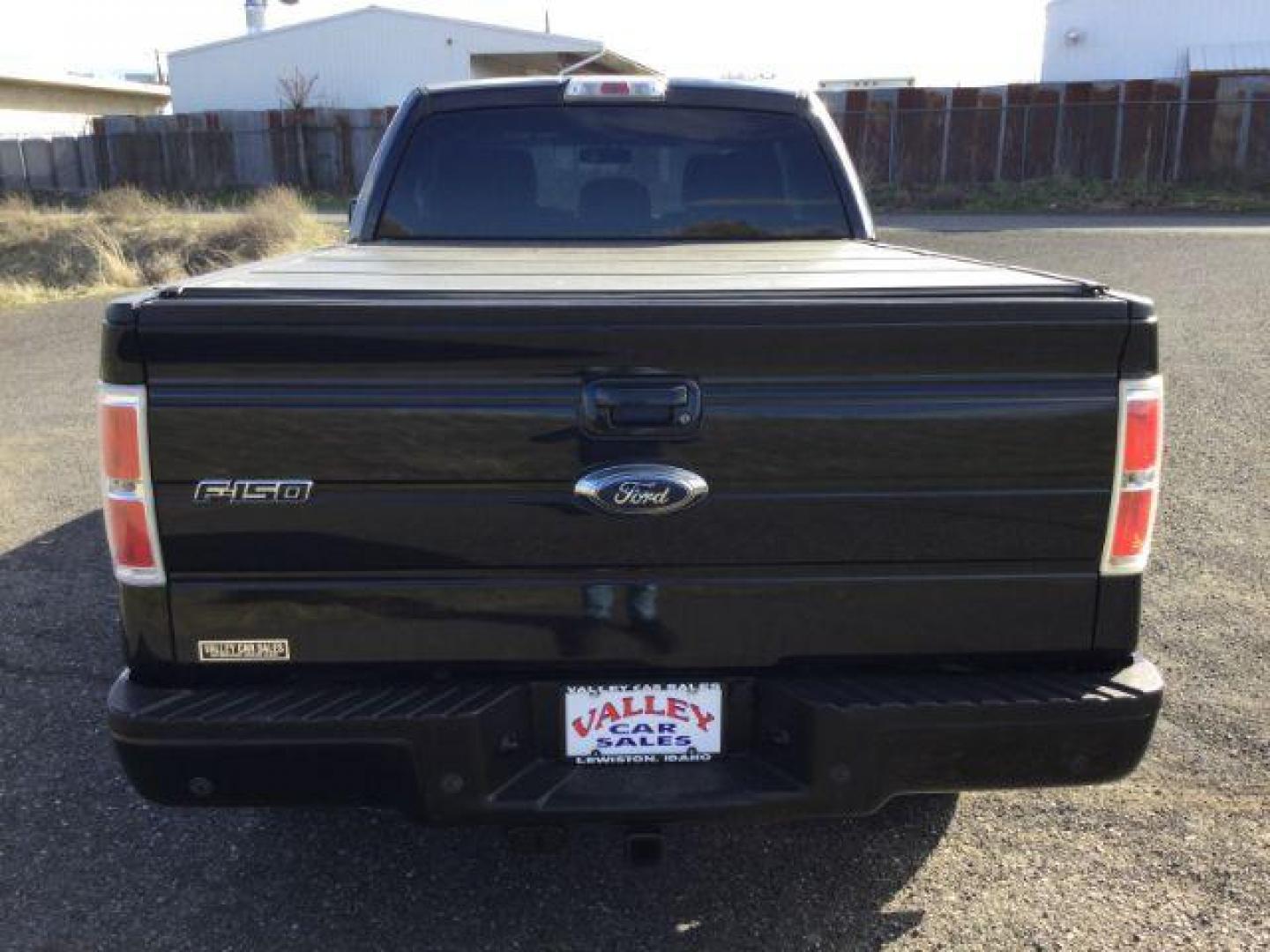 2012 Tuxedo Black Metallic /Black Cloth Ford F-150 FX4 Supercab 4WD (1FTFX1ET5CF) with an 5L V-8 DOHC engine, 6-SPEED AUTOMATIC transmission, located at 1801 Main Street, Lewiston, 83501, (208) 743-9371, 46.417065, -117.004799 - Photo#12