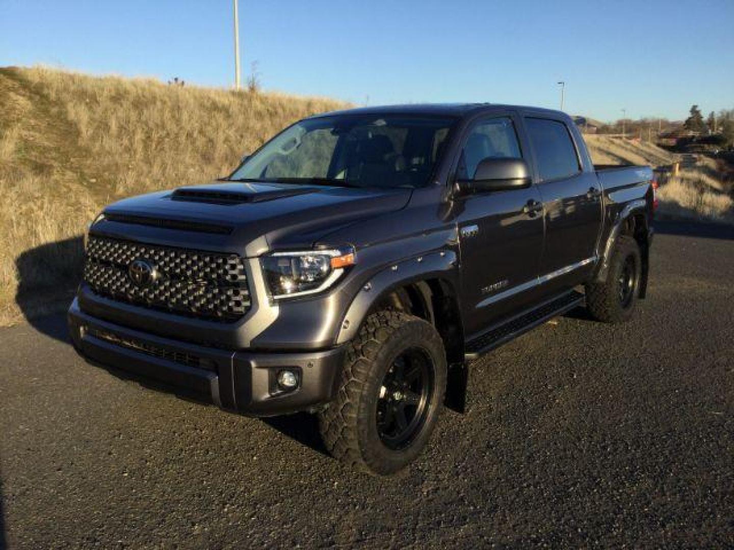 2021 Magnetic Gray Metallic /BLACK LEATHER TOYOTA TUNDRA Crew Max TRD Sport 4x4 (5TFDY5F13MX) with an 5.7 V8 engine, 6-Speed Automatic transmission, located at 1801 Main Street, Lewiston, 83501, (208) 743-9371, 46.417065, -117.004799 - Photo#0