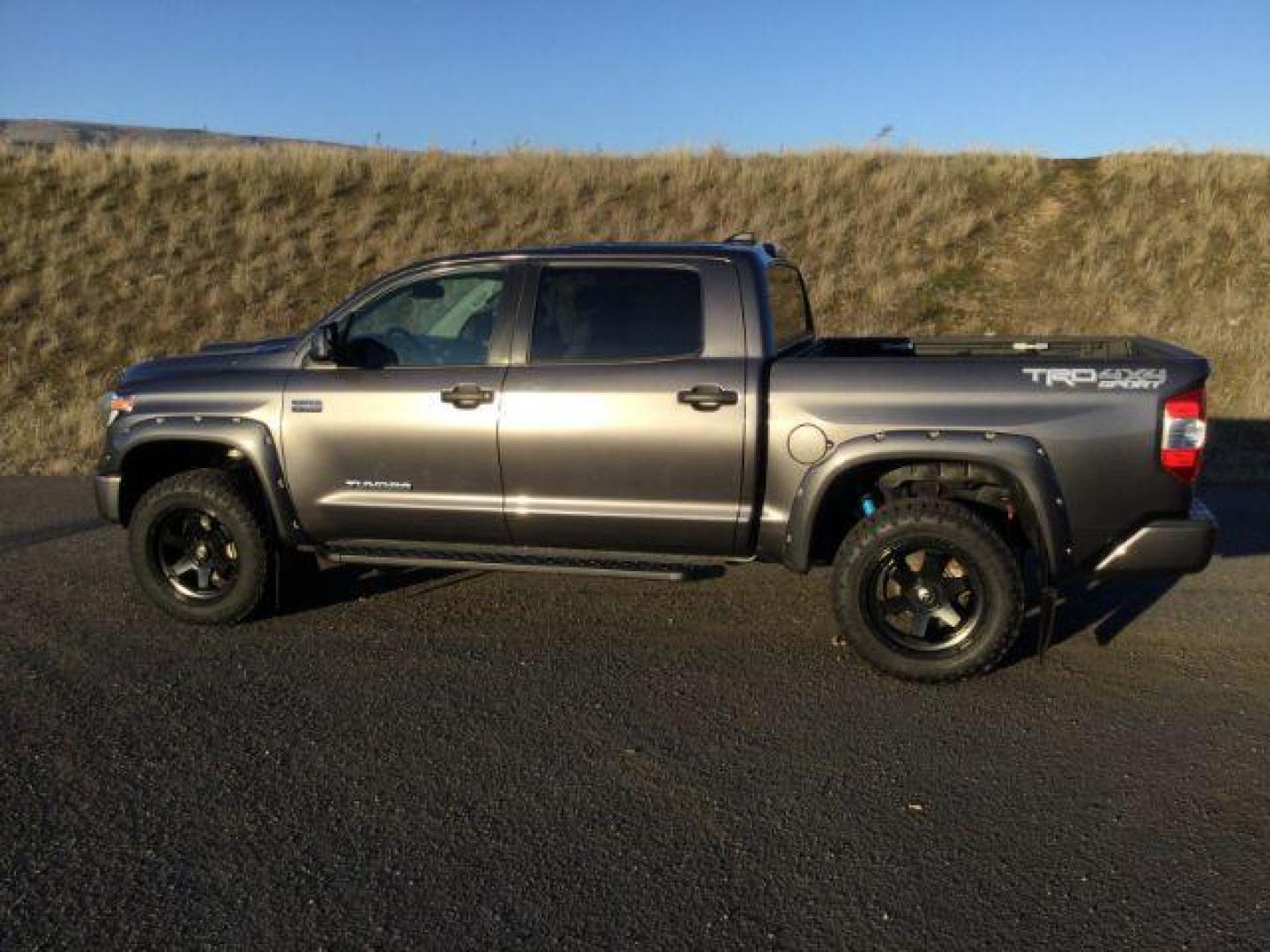 2021 Magnetic Gray Metallic /BLACK LEATHER TOYOTA TUNDRA Crew Max TRD Sport 4x4 (5TFDY5F13MX) with an 5.7 V8 engine, 6-Speed Automatic transmission, located at 1801 Main Street, Lewiston, 83501, (208) 743-9371, 46.417065, -117.004799 - Photo#1